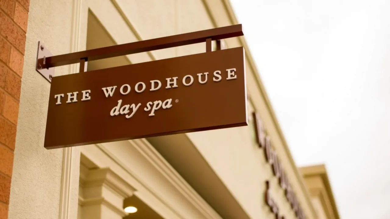Photo of exterior sign reading "The Woodhouse Day Spa"