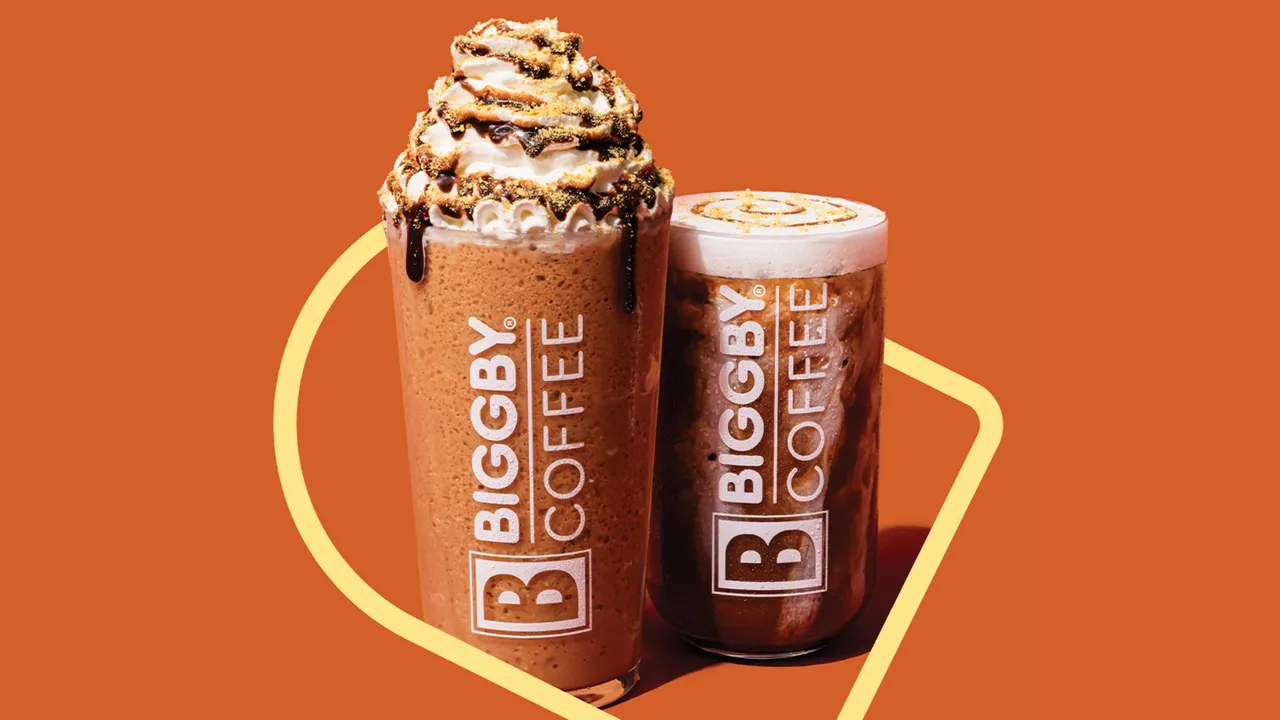 Photo of BIGGBY COFFEE summer beverages, iced and blended, against orange background