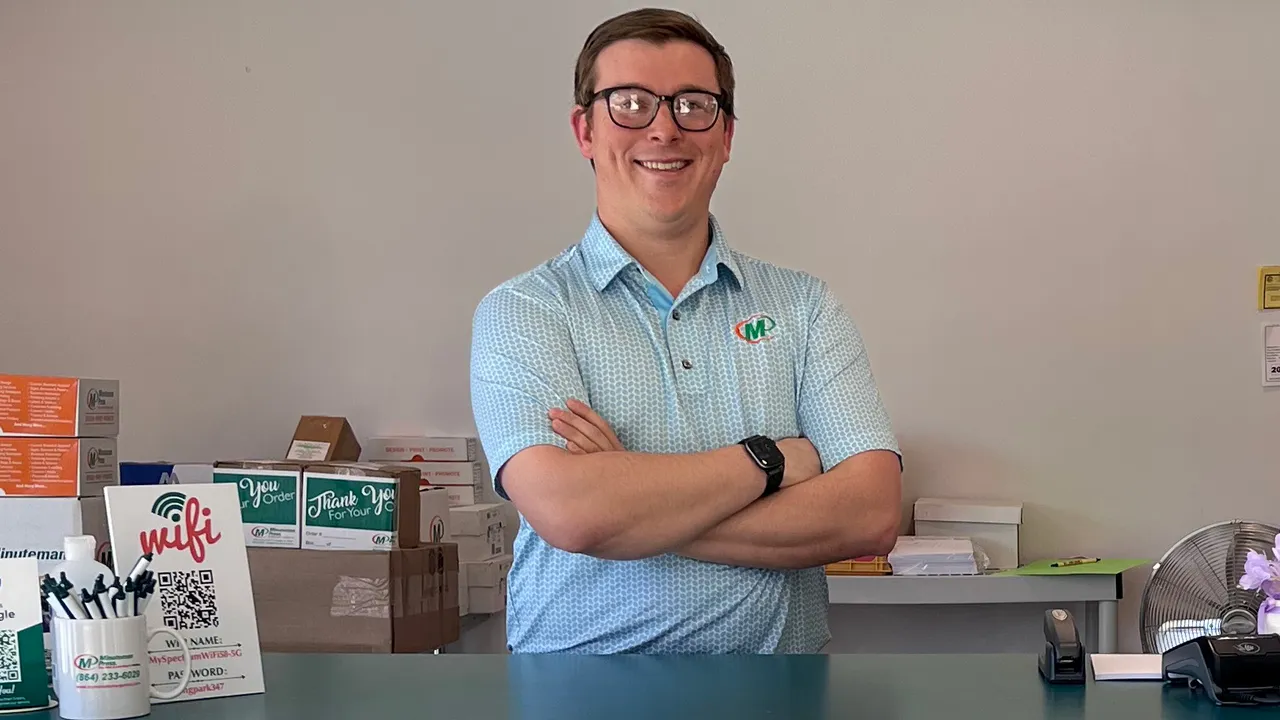 Minuteman Press Franchise Owner Corey Sanders at his center in Greenville, SC.