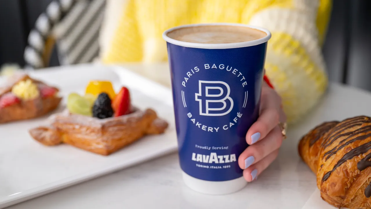image of a paris baguette bakery cafe latte with delicious food, croissants, and pastries