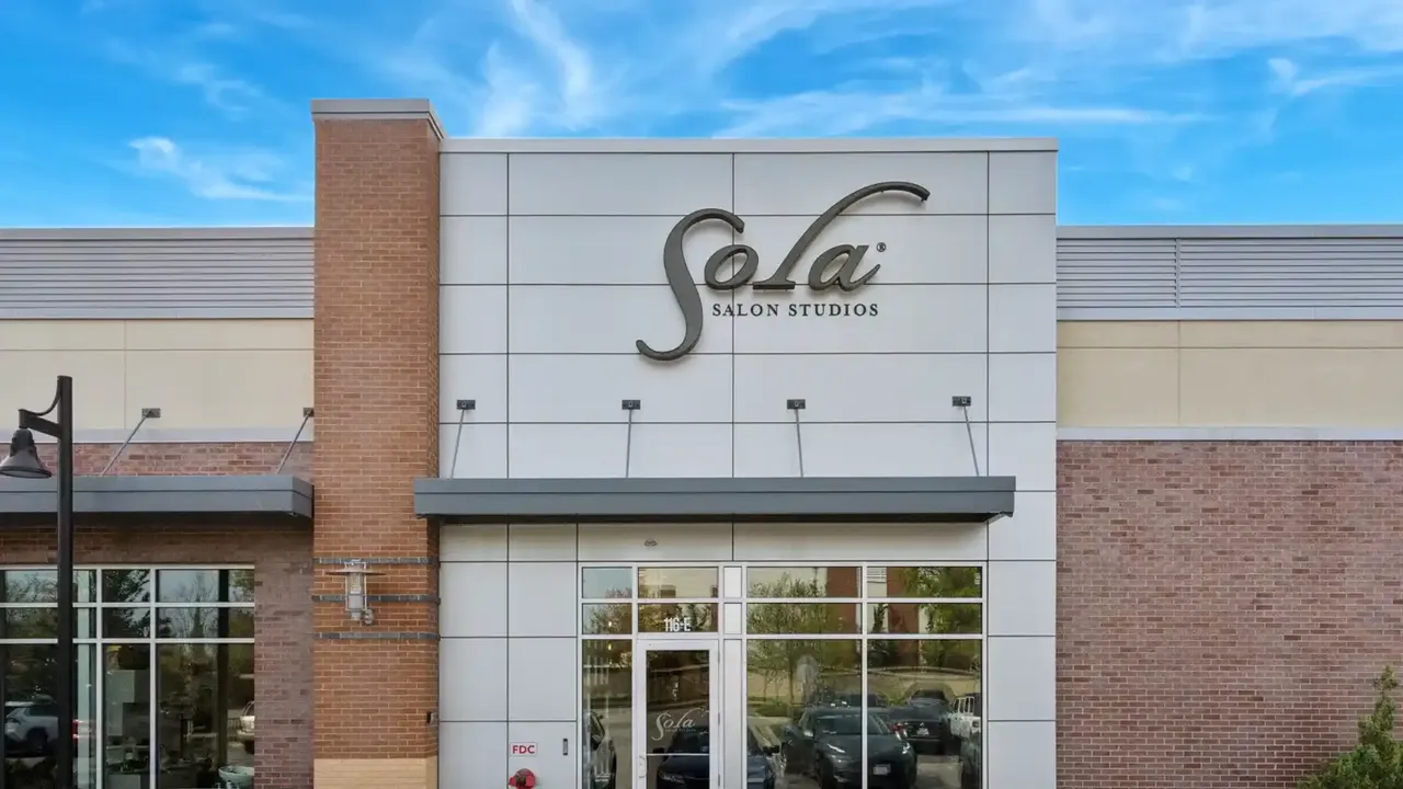 image of a sola salons franchise location building