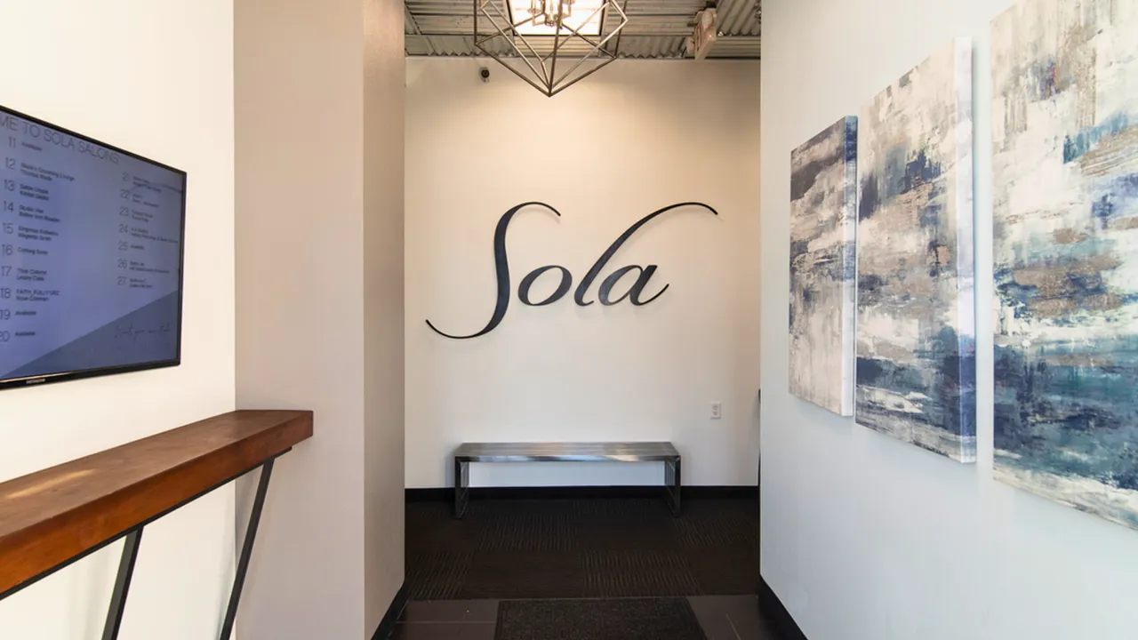 Image of sola salons franchise spa industry interior of a franchise building