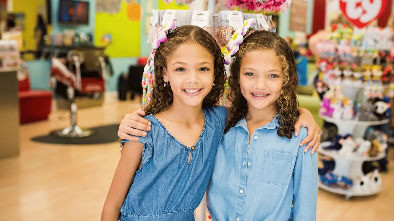 image of two girls at a pigtails and crewcuts