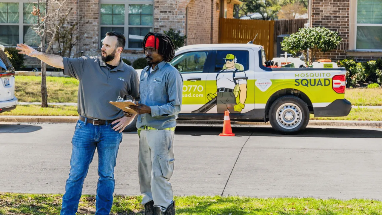 image of a mosquito squad franchisee visiting a site for bidding
