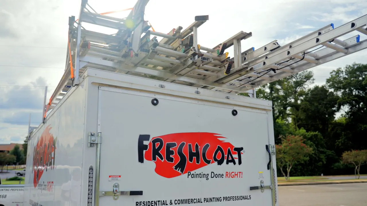 Photo of Fresh Coat vehicle with ladders on top