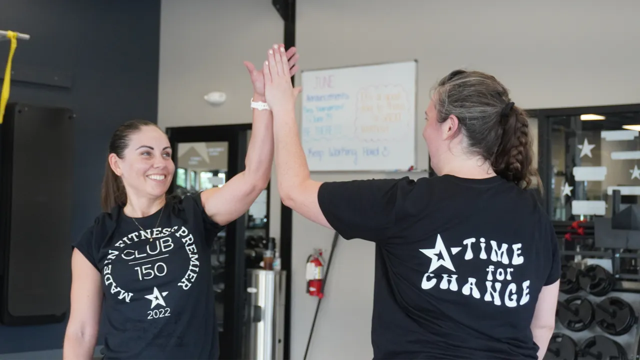 Photo of two Fitness Premier members 