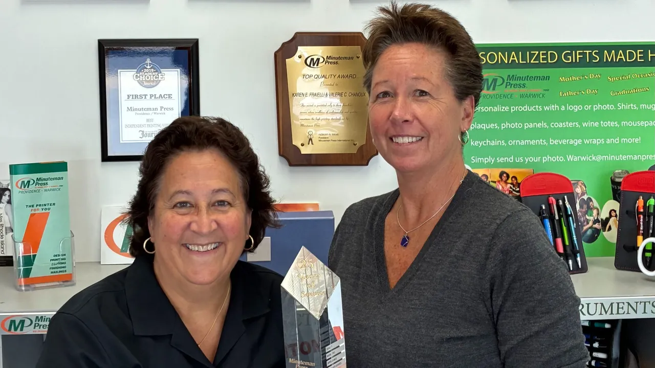 Minuteman Press franchise owners Karen Fraielli and Valerie Chanoux with their 25-year Award.