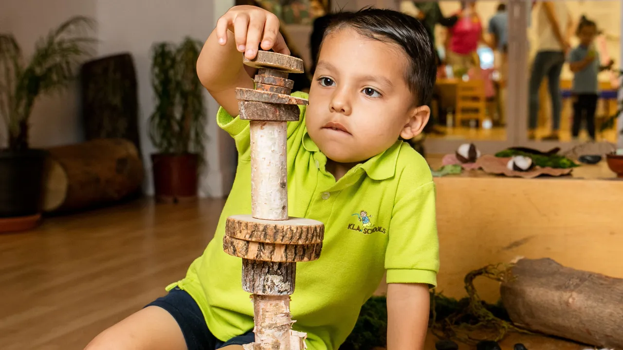 KLA Schools, child learning