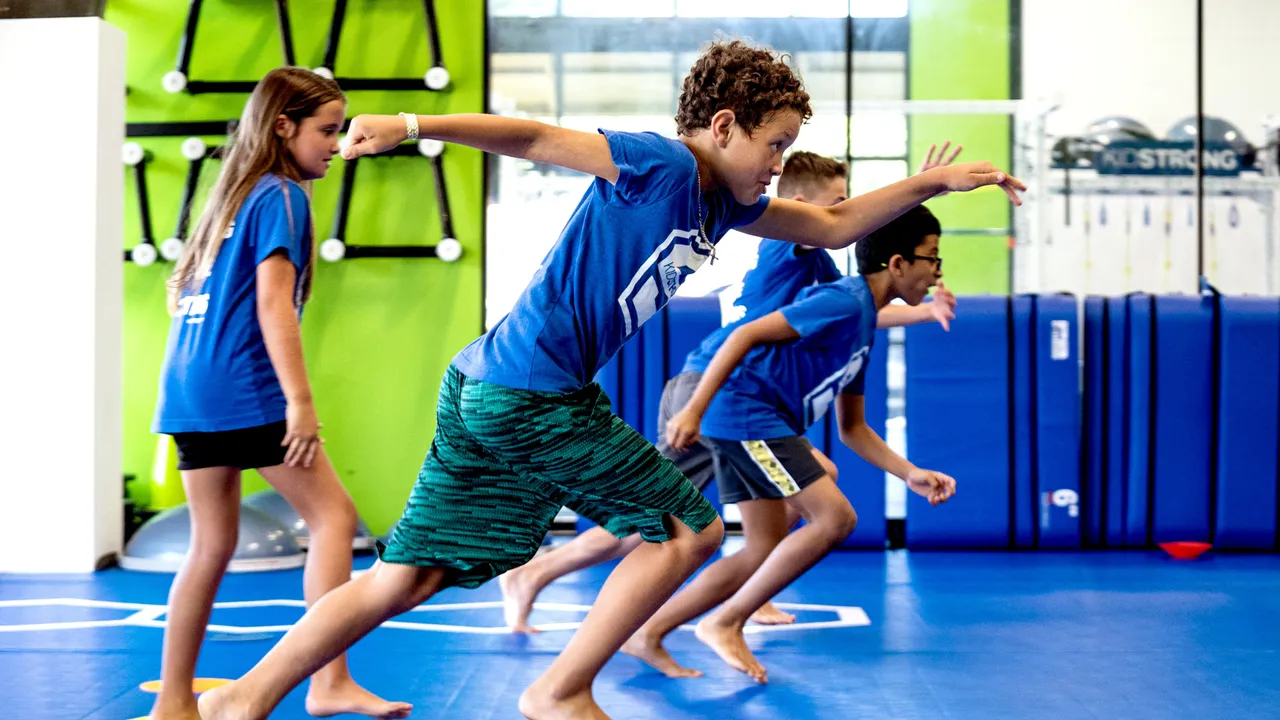 Photo of multiple students participating in KidStrong