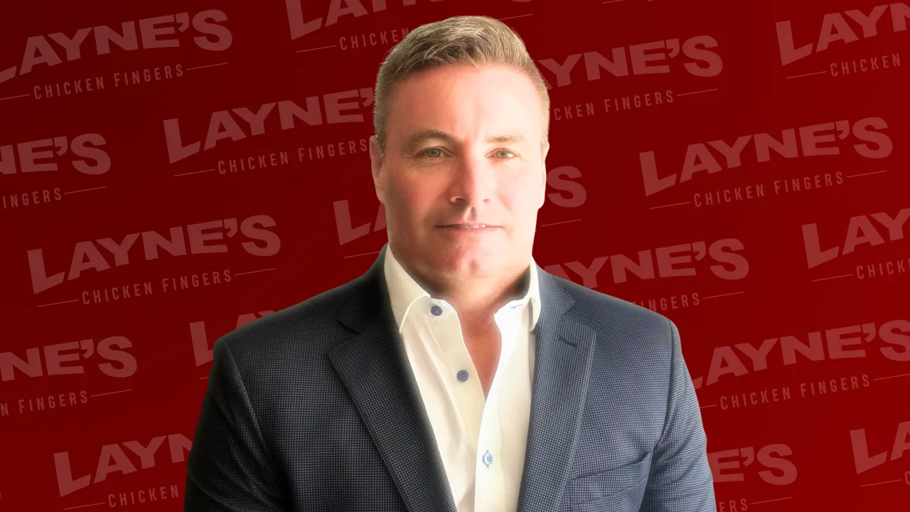 Photo of Layne's, Arby's franchisee Doug McGuire with Layne's Chicken Fingers logo