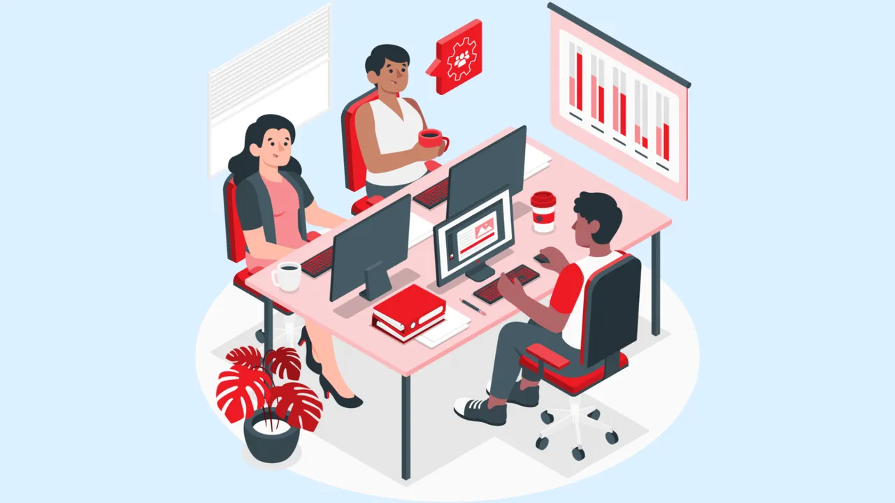 Design with people at desk, working on computers | BooXkeeping