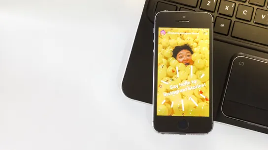 A phone displaying Instagram Stories