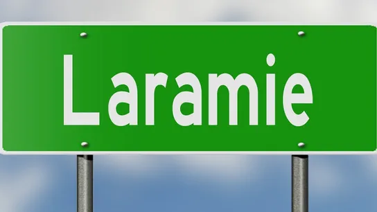 Laramie Grand opening pizza franchise