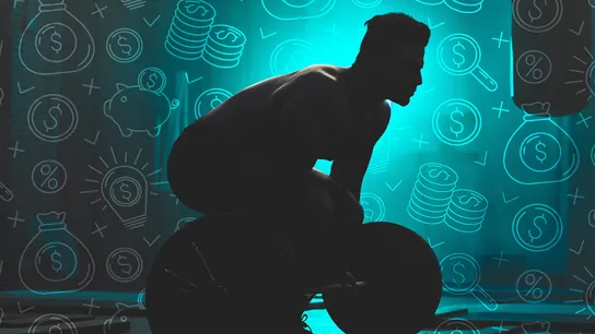 Silhouette of person deadlifting barbell against blue background 