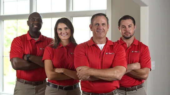 Photo of four HomeTeam Inspection Service inspectors
