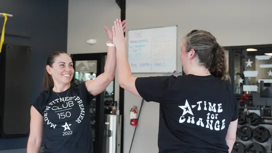 Photo of two Fitness Premier members 