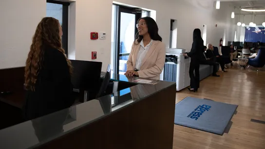 Express Employment Professionals franchise, people talking in a lobby