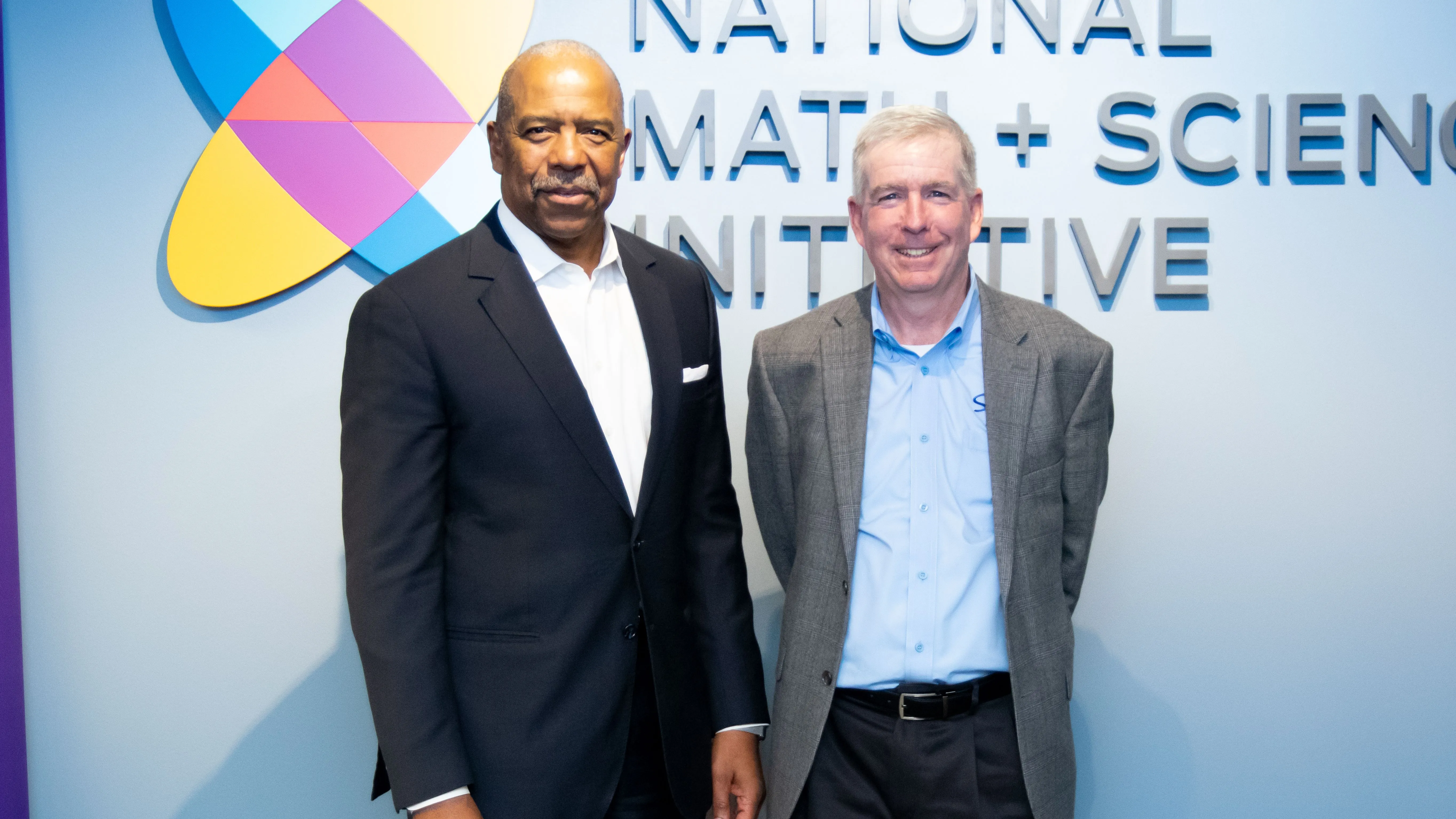 NMSI CEO Dr. Bernard A. Harris, Jr. and Sylvan Learning CEO John McAuliffe