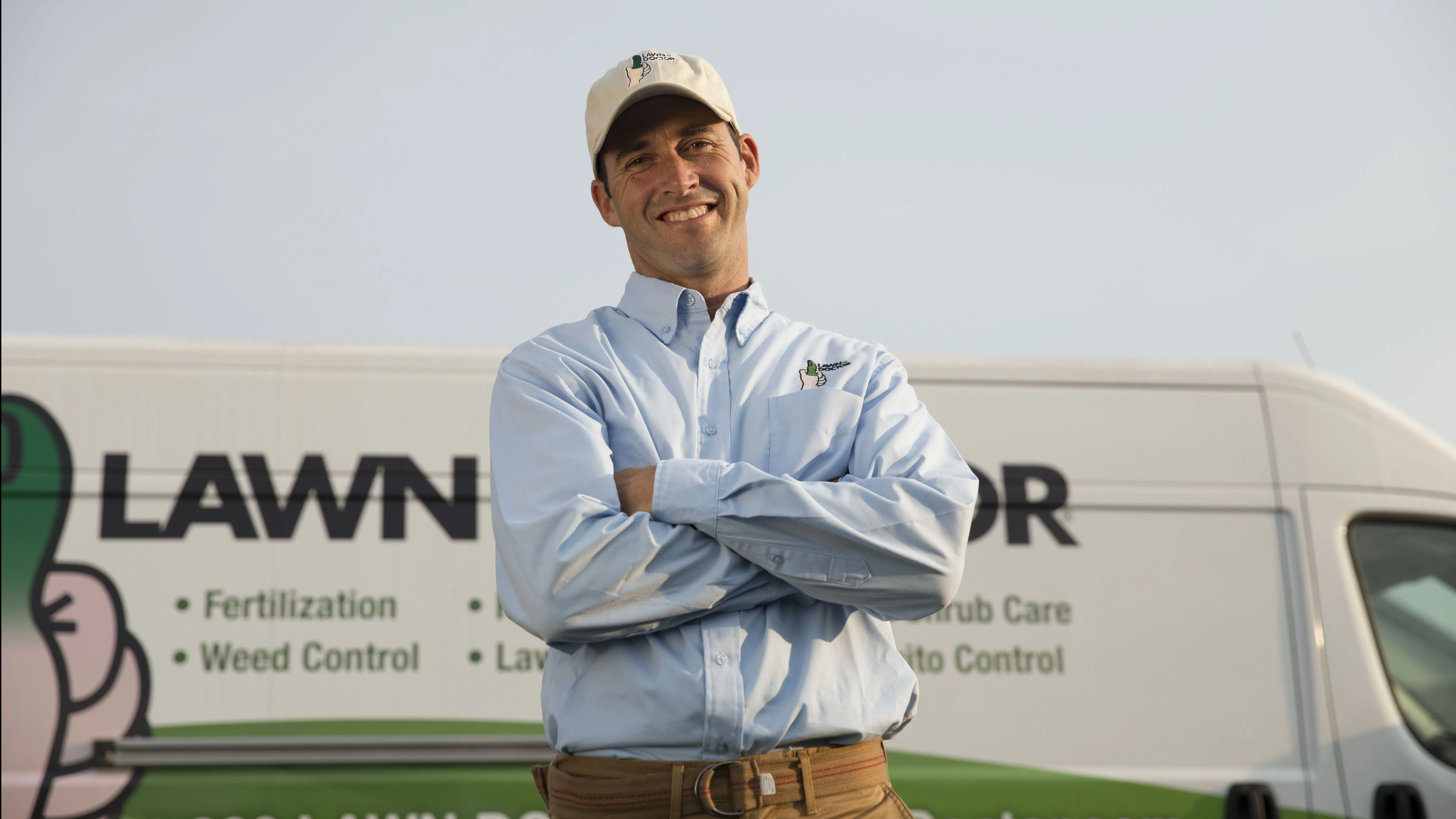 Lawn Doctor Franchise Owner and van