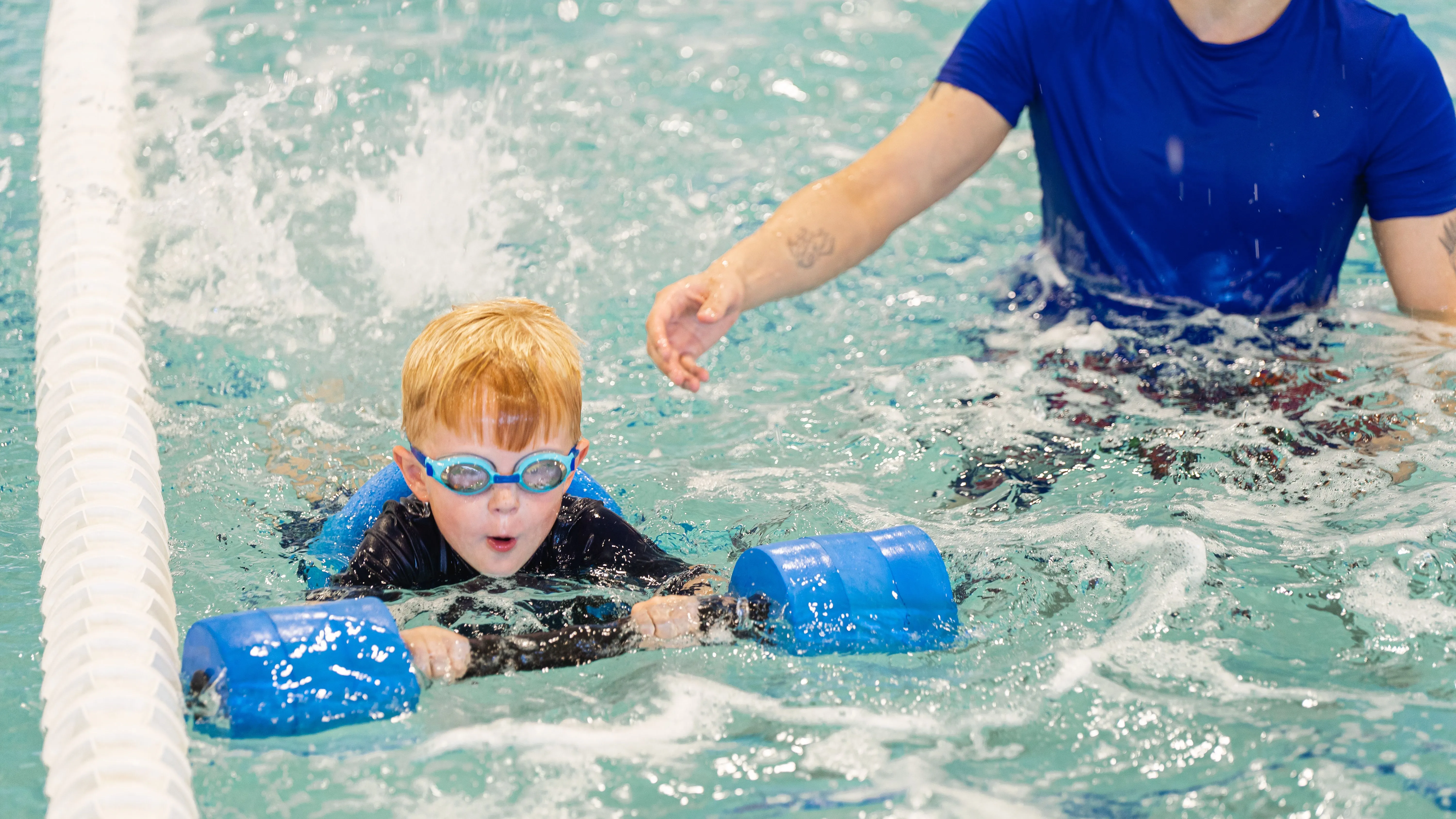 Big Blue Swim School boy swimming