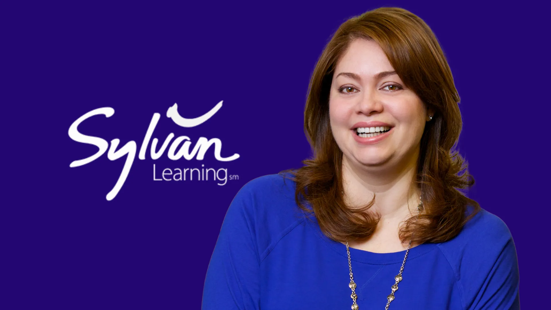 Sylvan Learning Brand President Susan Valverde stands against blue background