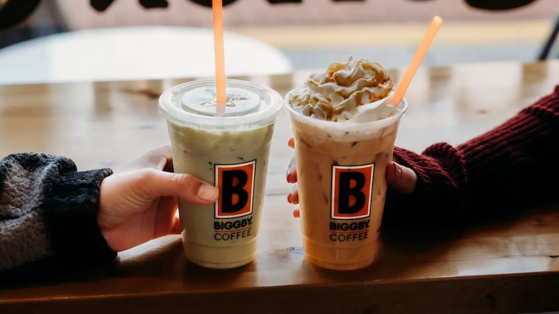 photo of two BIGGBY COFFEE iced beverages