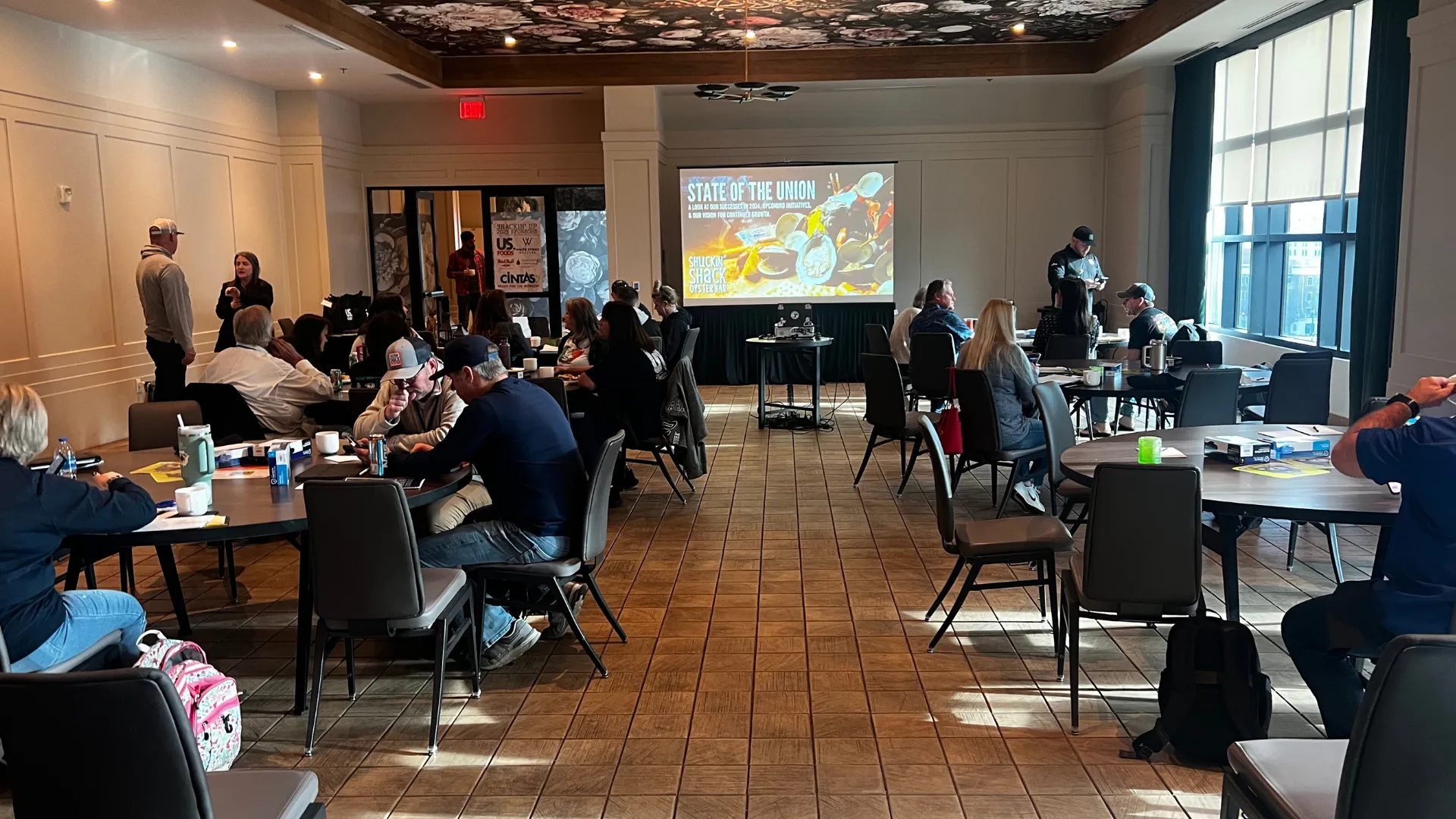 Photo of Shuckin' Shack team gathered in a room for the brand's State of the Union