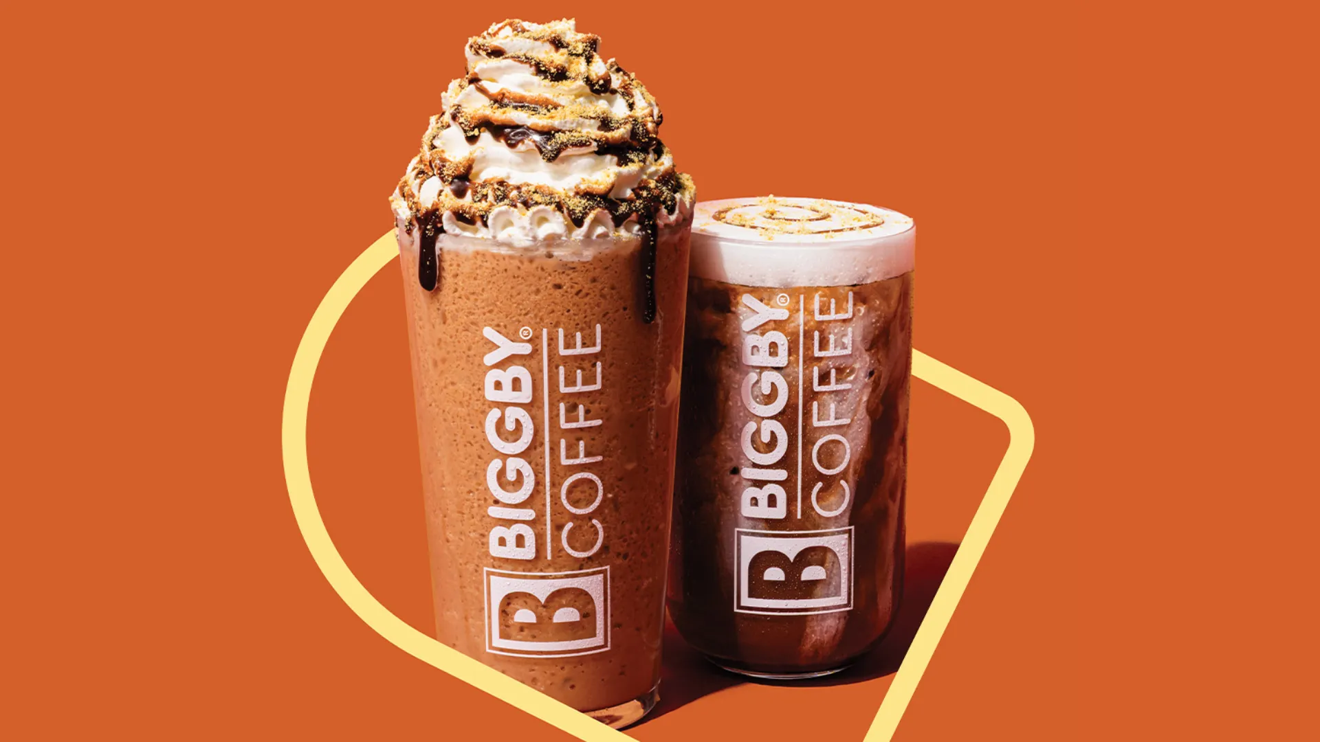 Photo of BIGGBY COFFEE summer beverages, iced and blended, against orange background