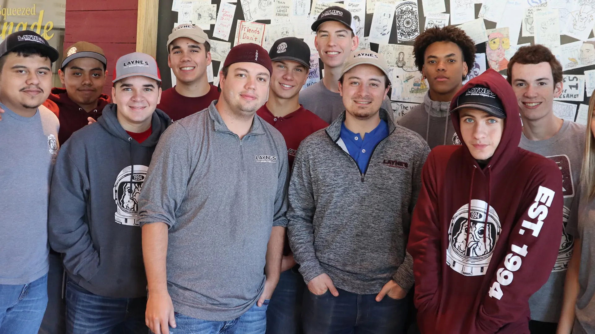 Photo of Layne's Chicken Fingers team standing together in restaurant